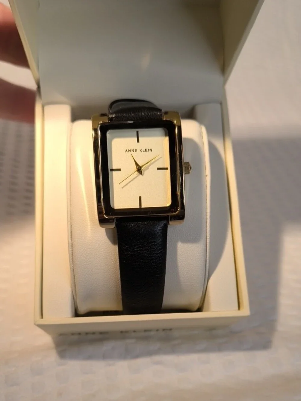 Anne Klein Women's Black Leather Strap Gold-Tone Rectangular Watch